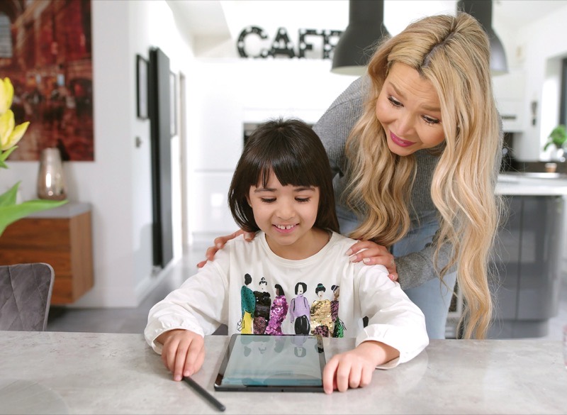 A Kumon Instructor working with a student